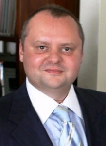 Gene Meltser Logo